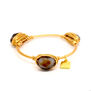 Gold wire wrapped stone bangle by Black & Sigi - assorted